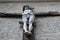 A picture of Jesus` crucifixion on the wall of the church in Halstat, Austria..