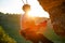 Picture of man clambering over rock.