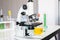 Picture of microscope with metal lens for research and medical equipment in laboratory