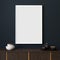Picture mockup with white vertical frame on dark blue wall. Stylish dark interior with decor and wooden cupboard and blanket pictu