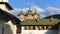 Picture of the Monastery of Sinaia during daytime under a cloudy sky in Romania