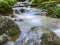 Picture of a mountain stream or creek flowing between rocks in Carpathian Mountains, Romania. Seven ladders canyon in Piatra Mare