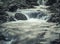 Picture of a mountain stream or creek flowing between rocks in Carpathian Mountains, Romania. Seven ladders canyon in Piatra Mare