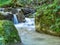 Picture of a mountain stream or creek flowing between rocks in Carpathian Mountains, Romania. Seven ladders canyon in Piatra Mare