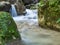 Picture of a mountain stream or creek flowing between rocks in Carpathian Mountains, Romania. Seven ladders canyon in Piatra Mare