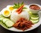 picture of a nasi lemak with a sunny egg and sauce.