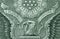 Picture of part of Great Seal of the United States with writing E Pluribus Unum, Out of many one, printed on One USA dollar