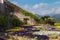 Picture postcard with terrace with flowers in the garden Villas Rufolo in Ravello. Amalfi Coast, Campania, Italy