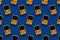 Picture of retro yellow game console pattern on blue background
