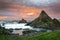 This is a picture of the rocky coast at Ballintoy on the Antrim Coast in Northern Ireland. It was taken at sunset