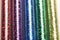 Picture of set five colors of glitters in glass jars - red, purple, blue, green, gold (yellow)