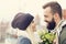 Picture showing young couple with flowers dating in the city