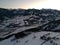 a picture of a snow covered mountains and valleys in winter