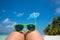 Picture of sunglasses on the tropical beach, vacation. Traveler