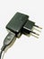 A picture of two pin charging adapter  ,