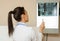 Picture of a woman doctor exploring spinal x-ray: lumbar and cervical region