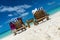 Picture of wooden beach chairs on the tropical beach, vacation.