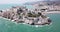 Picturesque aerial view of coastal line of Spanish tourist town of Peniscola with medieval castle on crag