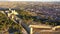 Picturesque aerial view of remains of ancient moorish Ayub Castle with fortification walls on top of green hill above