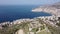 Picturesque aerial view of Saranda city stretching along Albanian coast of Ionian Sea overlooking Lekuresi Castle on