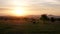 Picturesque African Landscape At Sunset In Hilly Savanna With Wild Animals