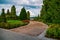 Picturesque alley along blooming roses in Italian Rose Garden on Flower Island Mainau on the Lake Constance, Germany