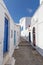 Picturesque alley in Plaka village, Milos island, Greece