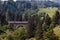 A picturesque Alpine landscape with an old railway bridge. Austria.
