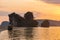 Picturesque asian colorful sunset landscape on Napparat Thara beach with cliffs in water in Krabi province in Thailand