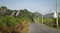 A picturesque asphalt road among low mountains.