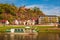 Picturesque atumn scenery with ship on Elbe river and resort Rathen in Saxony, Germany