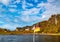 Picturesque atumn scenery with waving National Flag of Germany. Elbe river, Saxony, Germany