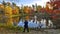 Picturesque autumn scenes of autumn leaf colour with the silhouette of a photographer