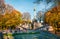 Picturesque autumn view of Angel of Peace Friedensengel monument, park statue of a golden angel on a column is a monument to