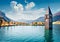 Picturesque autumn view of Tower of sunken church in Resia lake. Wonderful morning scene of Italian Alps, South Tyrol, Italy, Euro