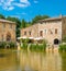 The picturesque Bagno Vignoni, near San Quirico d`Orcia, in the province of Siena. Tuscany, Italy.