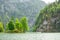 picturesque bavarian lake, koenigssee, bavaria, germany. The landscape of a mountain lake with a small island in the middle.
