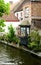 Picturesque Belgian house directly above the canal