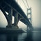 A picturesque bridge spanning a vast body of water with a foggy sky in the background
