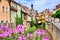 Picturesque buildings and flowers along a canal in the town of Marktbreit, Bavaria, Germany