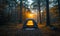 A picturesque camping site in nature with tents and campfire, forest, mountain, generated by AI