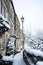 Picturesque christmas card scene of weavers cottages in the snow