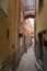 Picturesque colorful narrow curve small street with streetlight in Manarola, Italy