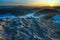 Picturesque colorful ridge of sunrise against the misty  hills