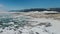 A picturesque, colourful landscape. A fantastic pattern of snow, ice and bubbles