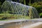 Picturesque dancing fountain in Sofievsky park, Uman, Ukraine. Fountain show, creative water design