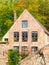 Picturesque detail of an old brick house, Bruges, Belgium