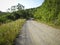 A picturesque dirt mountain road to the pass among the low mountains.