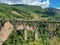 Picturesque Djurdzhevich Bridge. Montenegro. Reinforced concrete arch bridge over the Tara river. Mountains