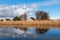 Picturesque dutch countryside landscape reflected in water